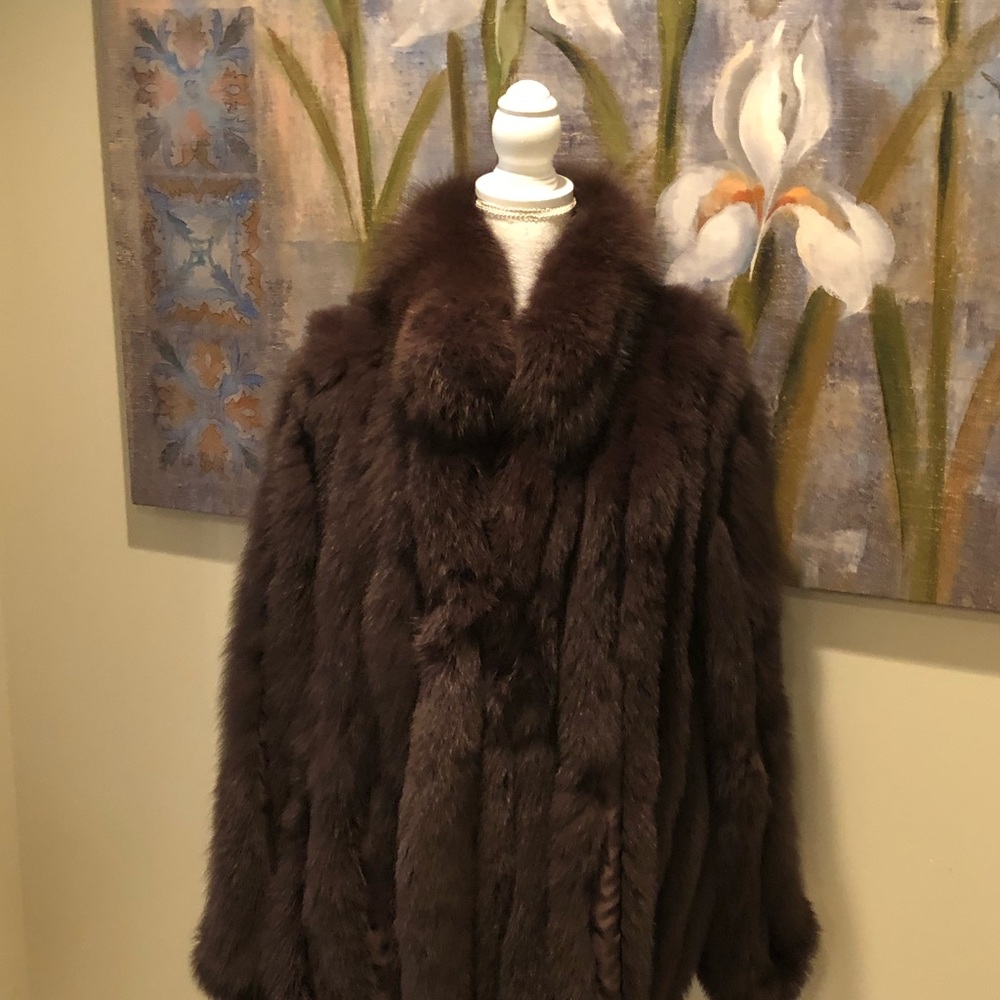 Reversible soft brown fox jacket. Woman’s size 2x. In excellent condition.